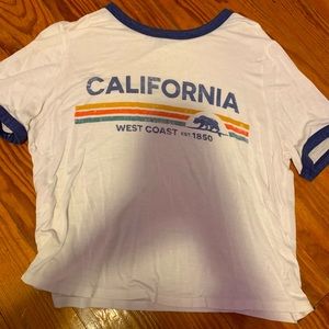 A white graphic tee from Charlotte Russe.